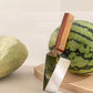 Driehoekige fruitsnijder van roestvrij staal met houten handvat voor in de keuken